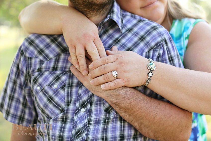 BEAUTI photography Oungre Park engagement photographer Saskatchewan wedding photographer summer engagement ring photo