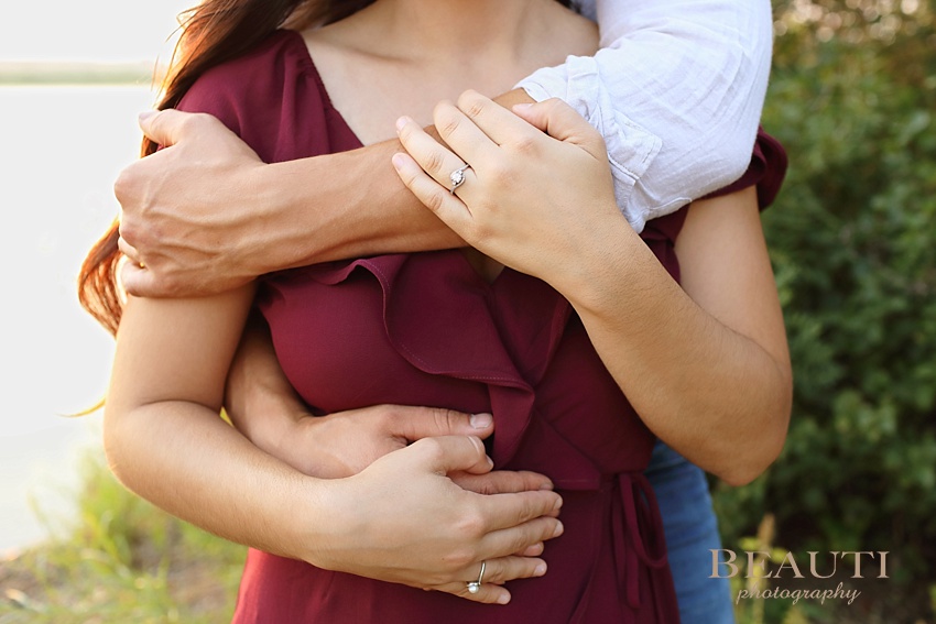Weyburn engagement photographer newly engaged Sask wedding photographer Nickle Lake engagement ring photo