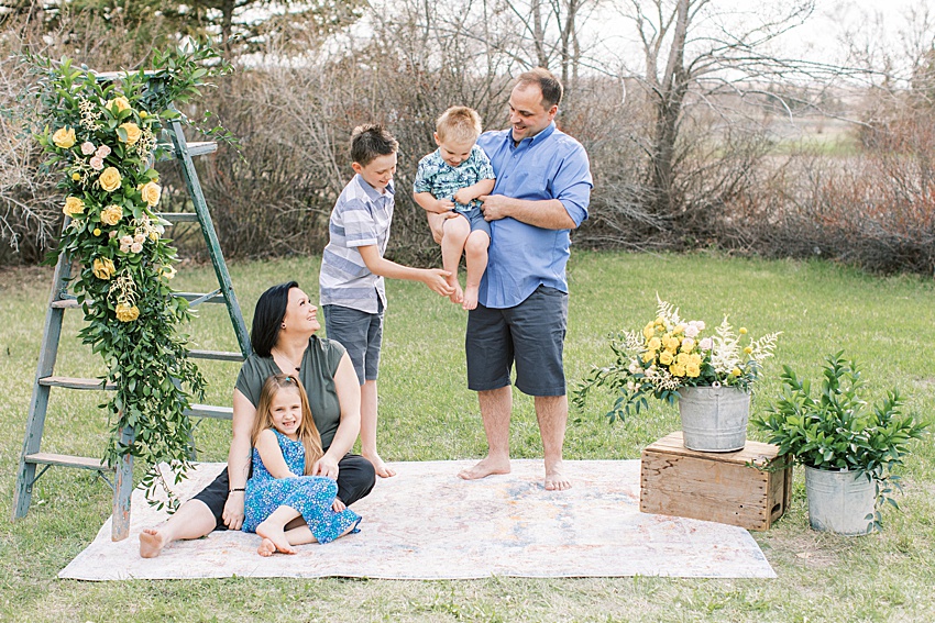 spring family photos BEAUTI photography Weyburn Saskatchewan photographer Brady's House of Flowers