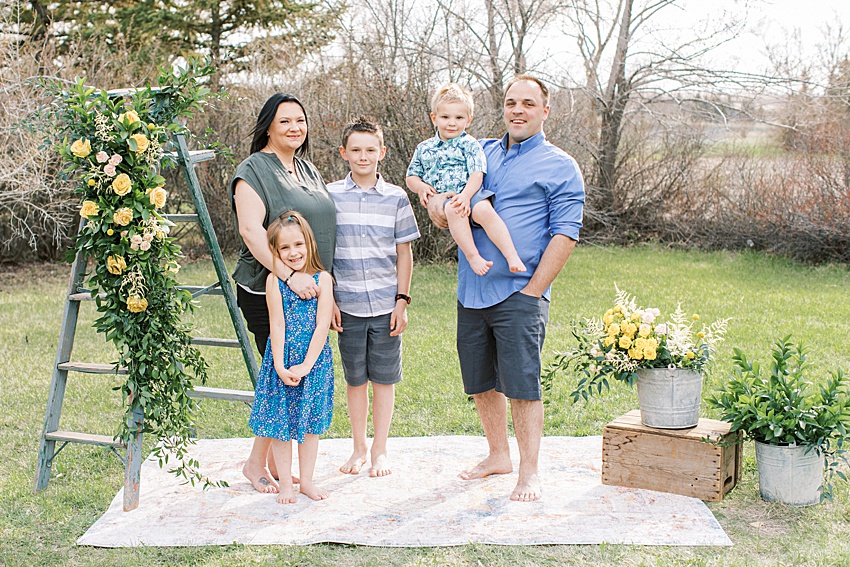 spring family photos BEAUTI photography Weyburn Saskatchewan photographer Brady's House of Flowers