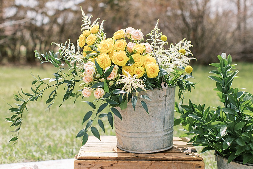 BEAUTI photography Weyburn Saskatchewan photographer Brady's House of Flowers tin bucket arrangement