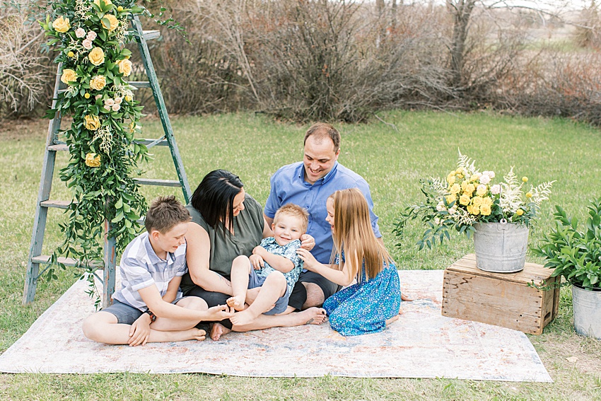 spring family photos BEAUTI photography Weyburn Saskatchewan photographer Brady's House of Flowers