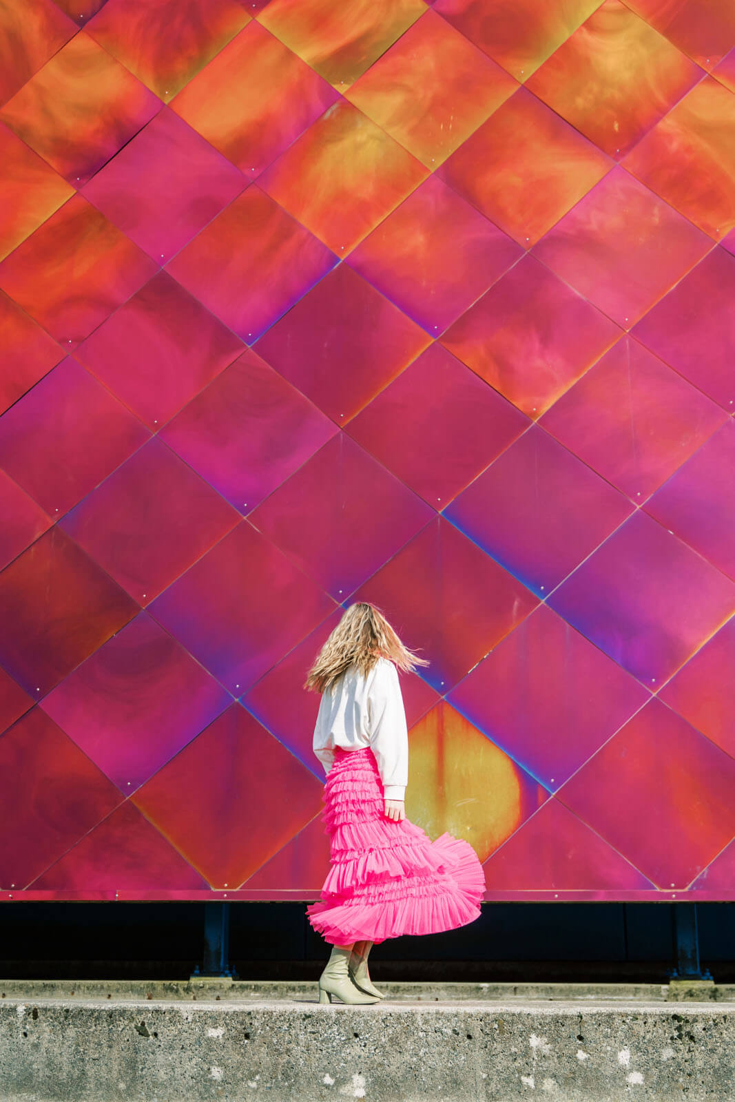 Jenelle Quigley Photography Nanaimo Vancouver Island British Columbia lifestyle photographer pink wall pink skirt twirling young lady