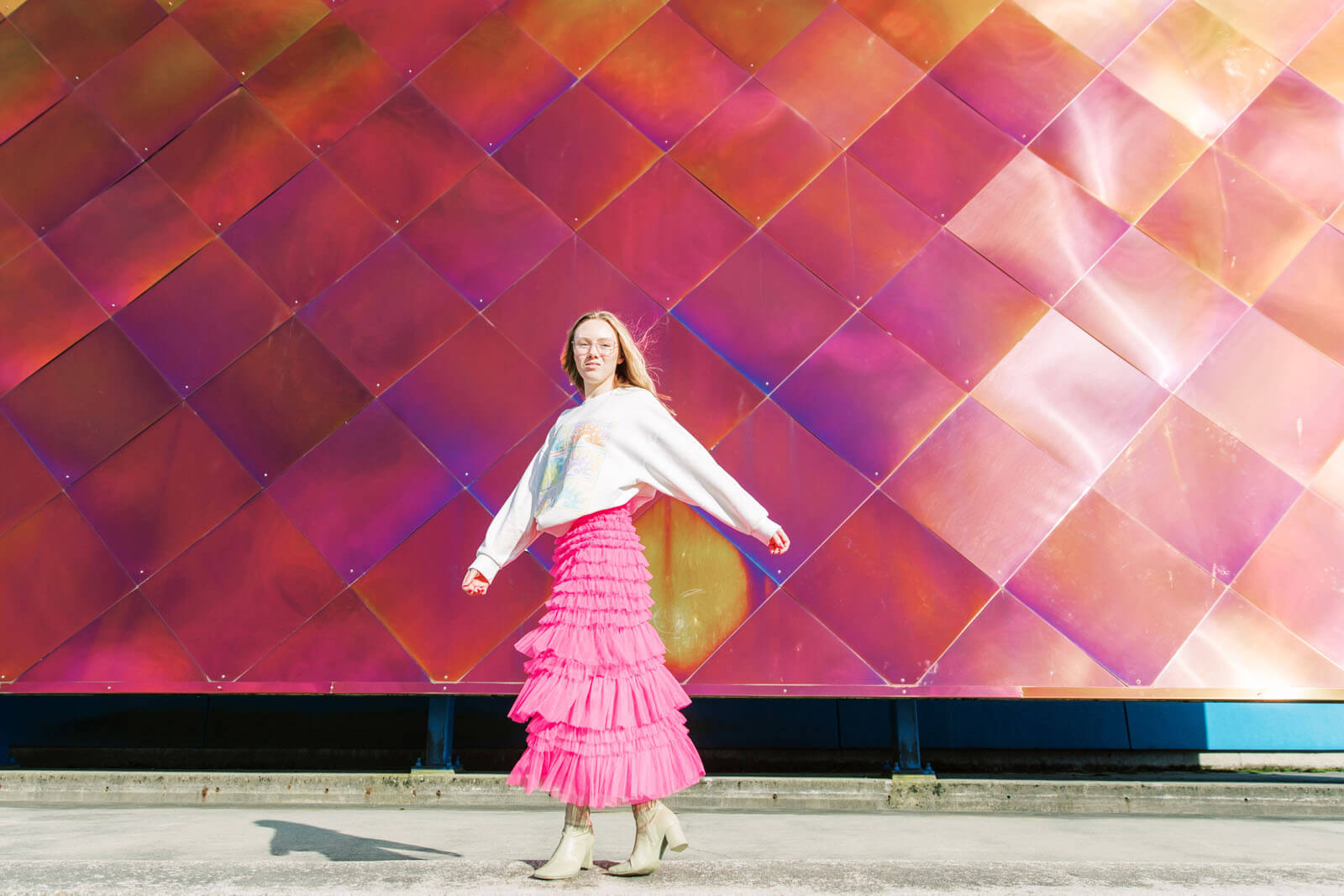 Jenelle Quigley Photography Nanaimo Vancouver Island British Columbia lifestyle photographer pink wall pink skirt twirling young lady Happy Love Day