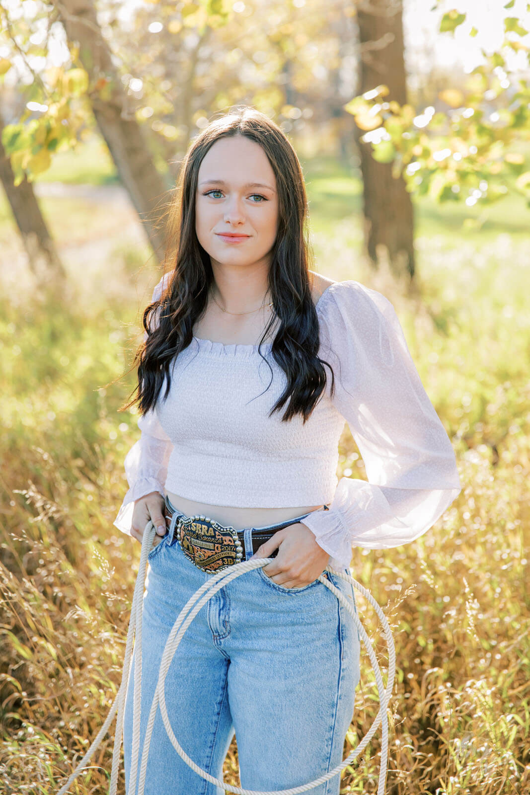 Jenelle Quigley Photography Saskatchewan lifestyle photographer fall grad casuals in Radville class of 2024 western theme rodeo horses