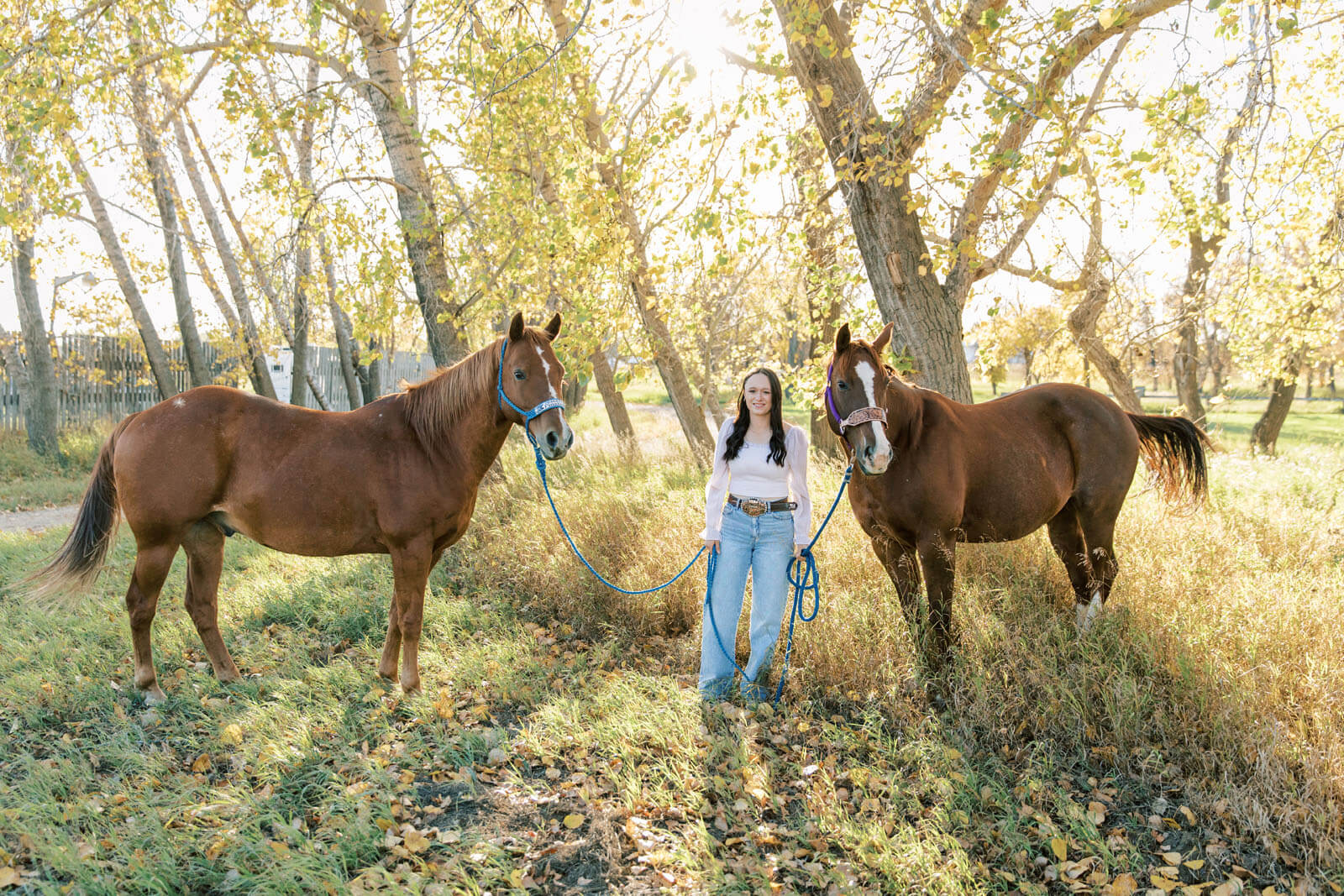 Jenelle Quigley Photography Saskatchewan lifestyle photographer fall grad casuals in Radville class of 2024 western theme rodeo horses