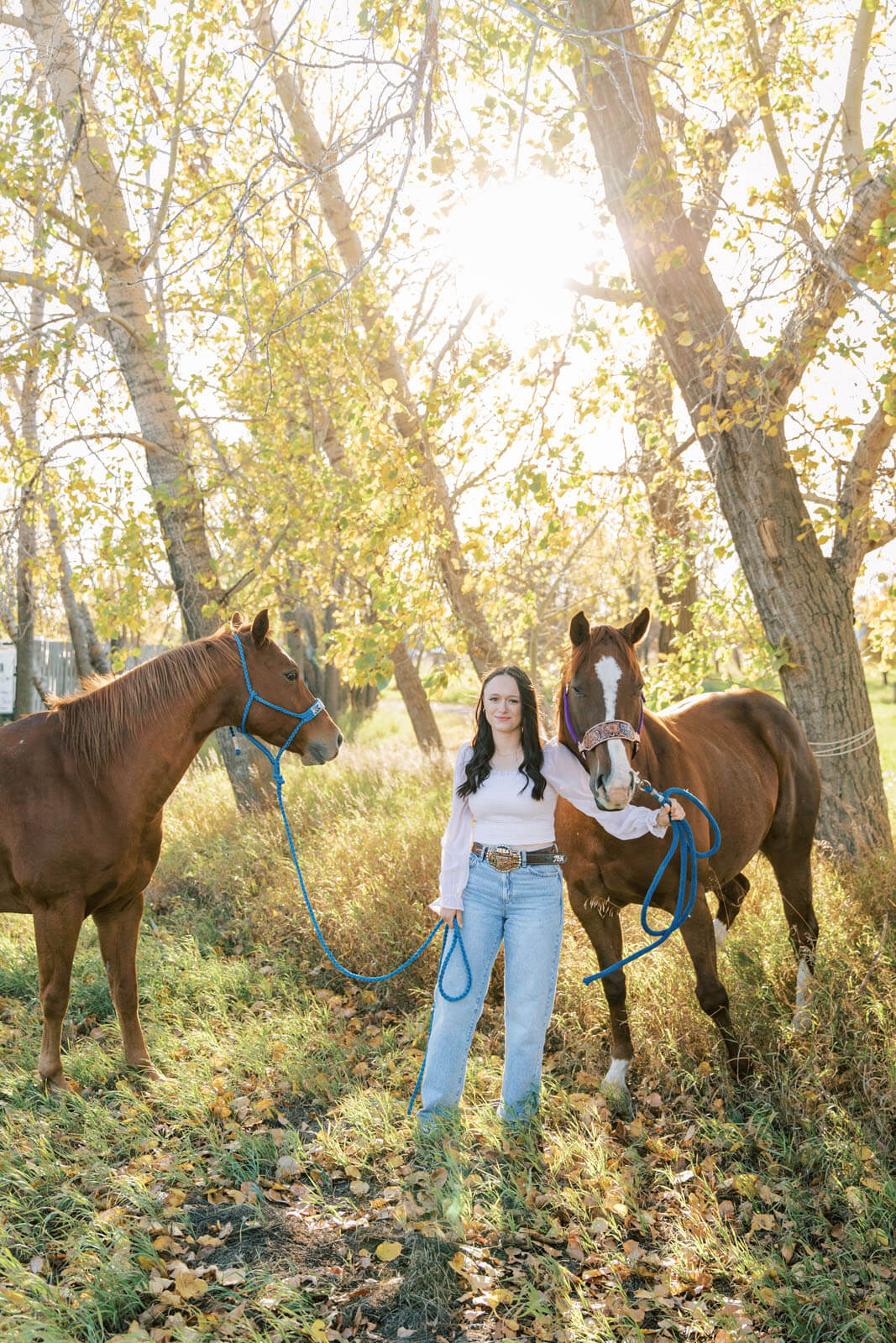 Jenelle Quigley Photography Saskatchewan lifestyle photographer fall grad casuals in Radville class of 2024 western theme rodeo horses