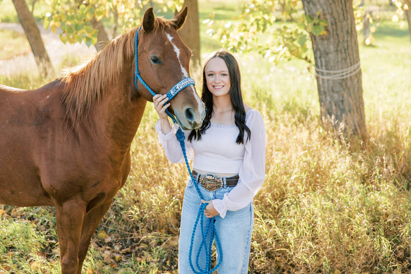 Jenelle Quigley Photography Saskatchewan lifestyle photographer fall grad casuals in Radville class of 2024 western theme rodeo horses