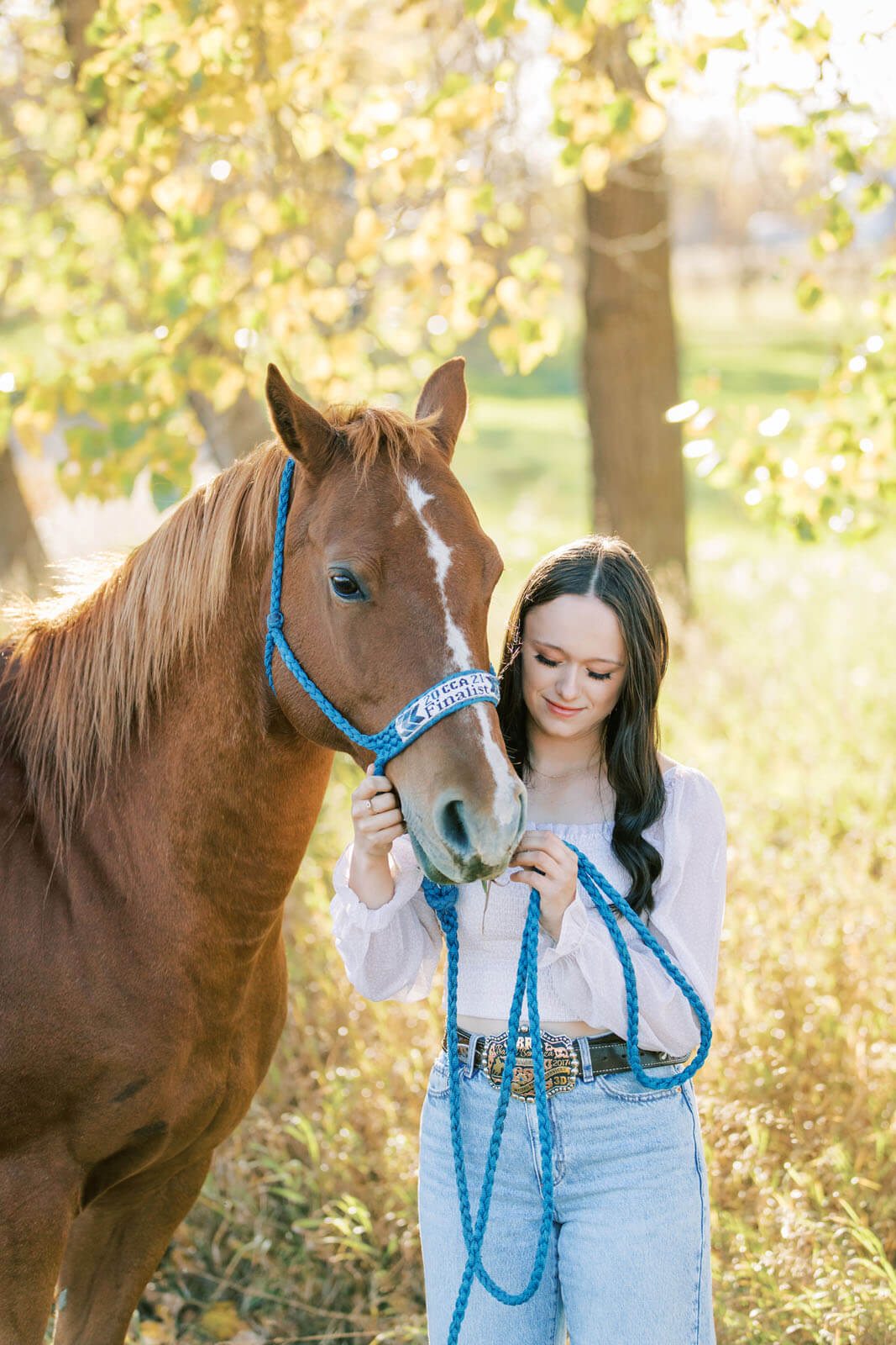 Jenelle Quigley Photography Saskatchewan lifestyle photographer fall grad casuals in Radville class of 2024 western theme rodeo horses