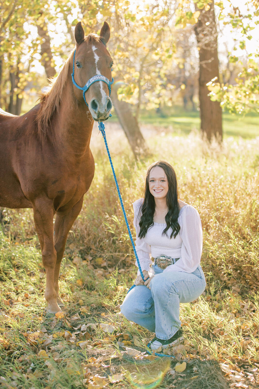 Jenelle Quigley Photography Saskatchewan lifestyle photographer fall grad casuals in Radville class of 2024 western theme rodeo horses