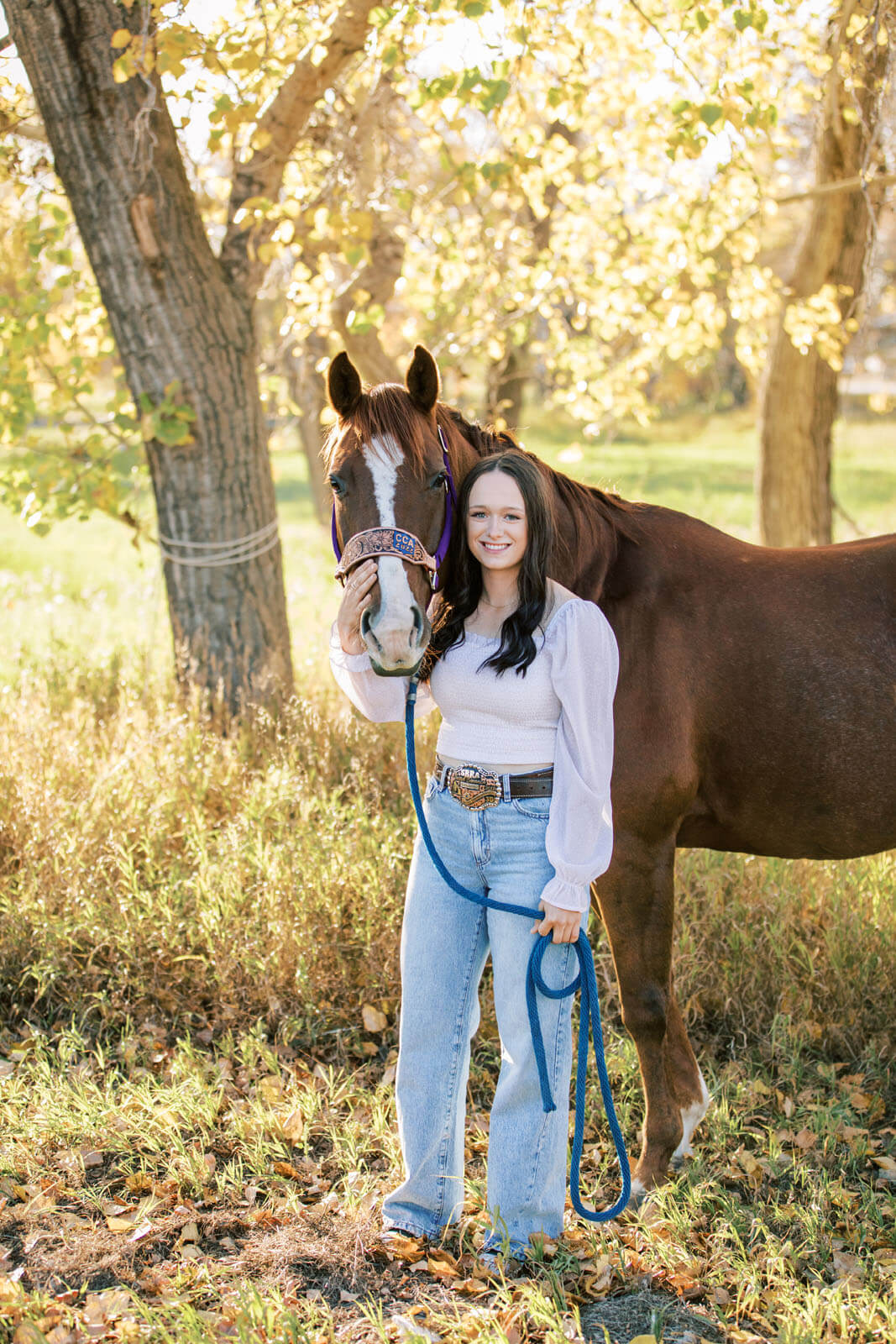 Jenelle Quigley Photography Saskatchewan lifestyle photographer fall grad casuals in Radville class of 2024 western theme rodeo horses