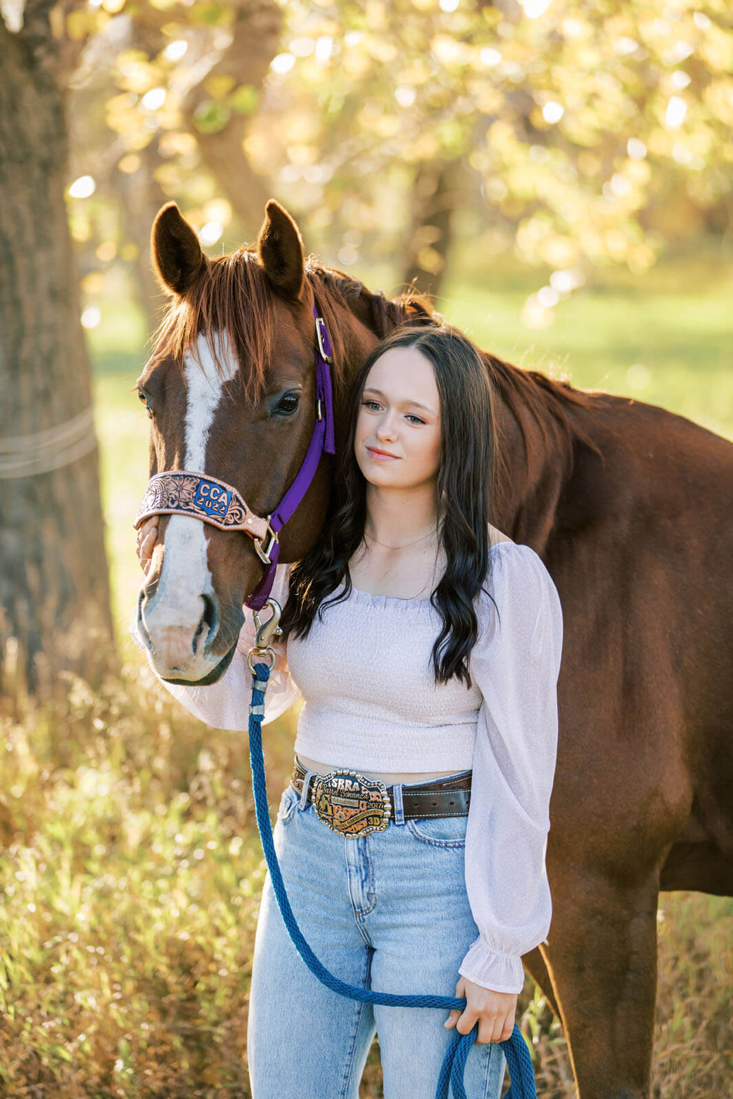 Jenelle Quigley Photography Saskatchewan lifestyle photographer fall grad casuals in Radville class of 2024 western theme rodeo horses