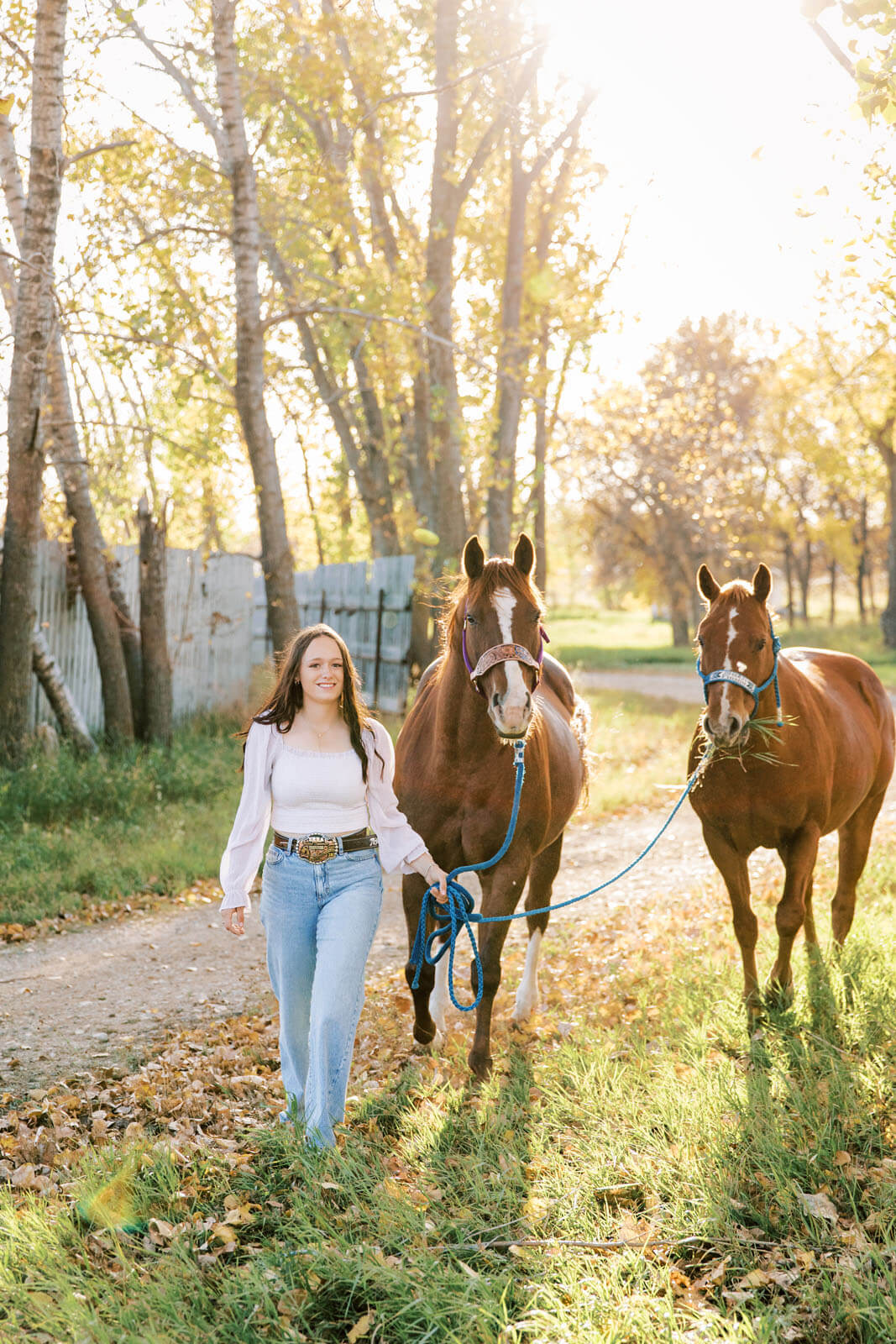 Jenelle Quigley Photography Saskatchewan lifestyle photographer fall grad casuals in Radville class of 2024 western theme rodeo horses
