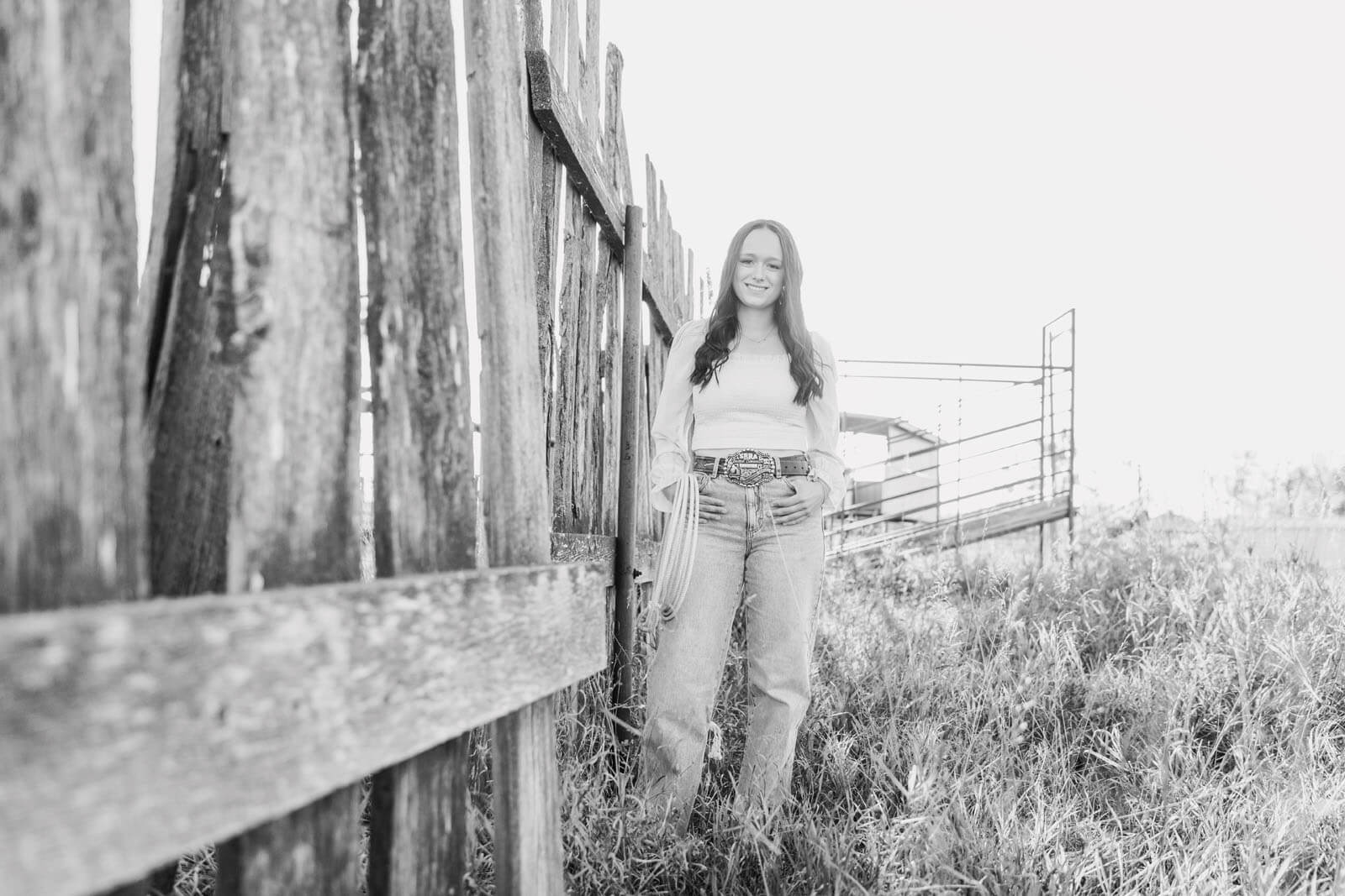 Jenelle Quigley Photography Saskatchewan lifestyle photographer fall sunset class of 2024 western belt buckle lariat roping