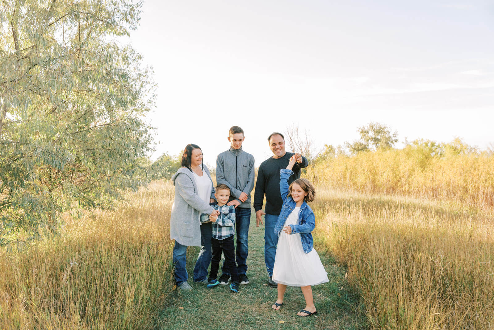 Jenelle Quigley Photography Weyburn family lifestyle photographer fall 2023 photos twirling