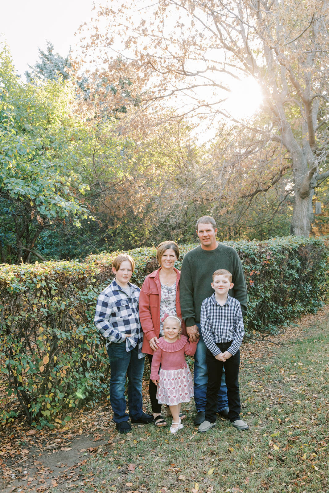 Jenelle Quigley Photography Weyburn Saskatchewan family lifestyle photographer fall 2023 outdoor photos family walking