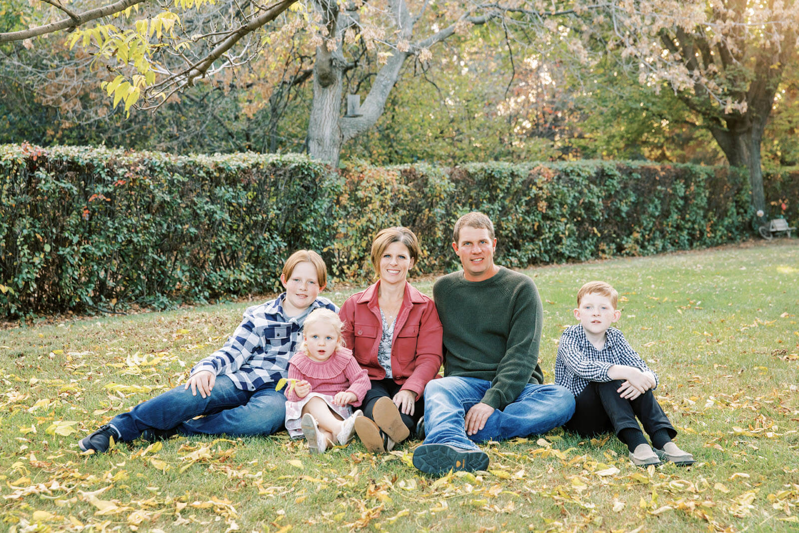 Jenelle Quigley Photography Weyburn Saskatchewan family lifestyle photographer fall 2023 outdoor photos family walking