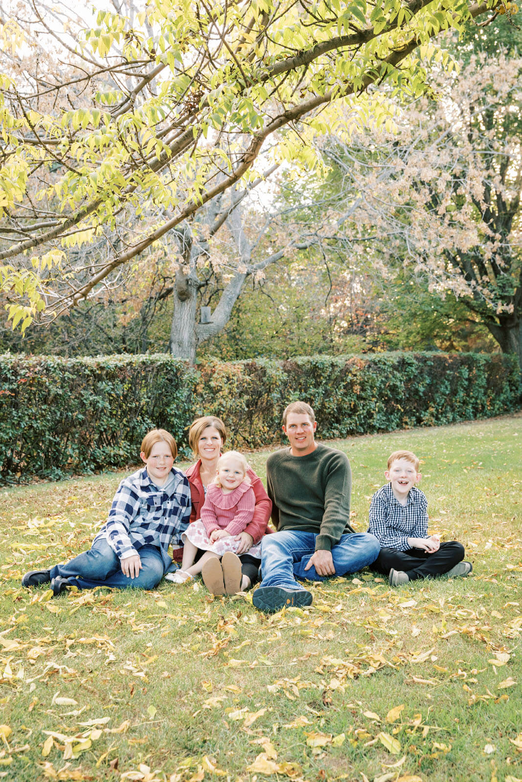 Jenelle Quigley Photography Weyburn Saskatchewan family lifestyle photographer fall 2023 outdoor photos family walking