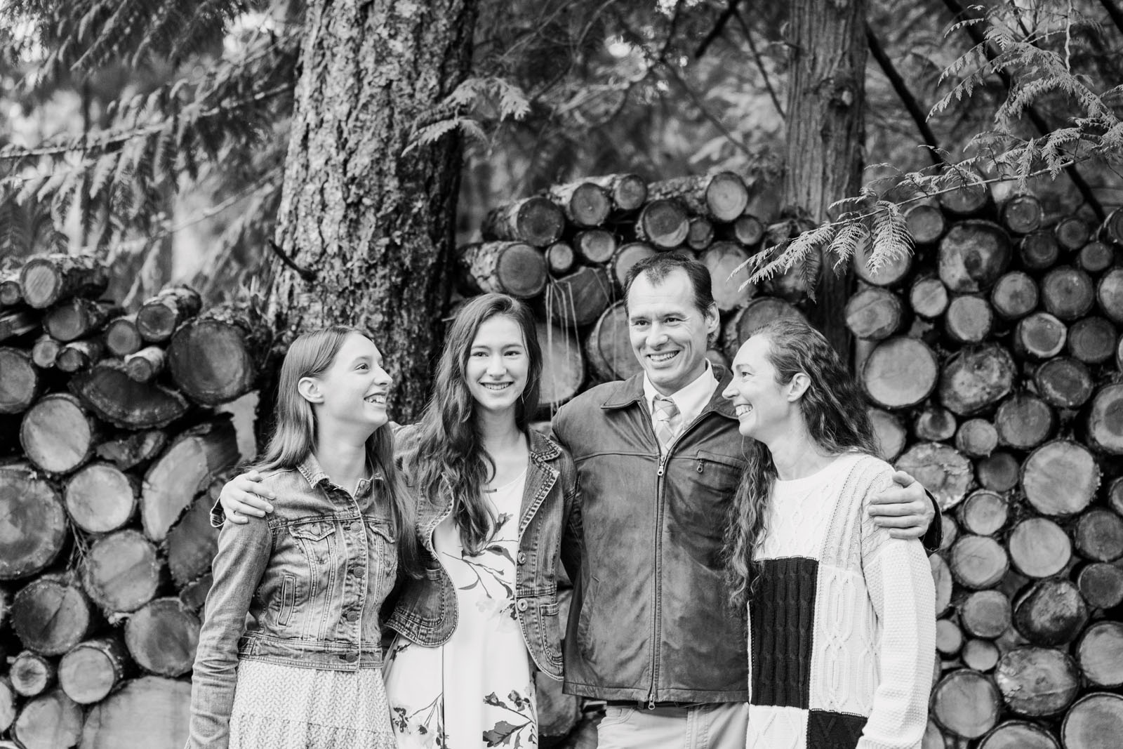 Jenelle Quigley Photography British Columbia lifestyle photographer forest acreage family portraits wood pile